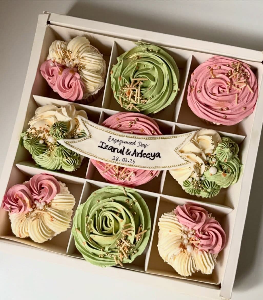 Nine engagement cupcakes with a matcha strawberry theme